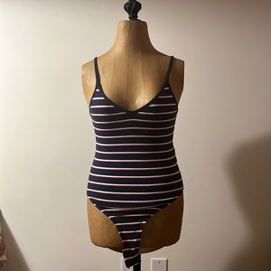 Blue, red, and white striped bodysuit